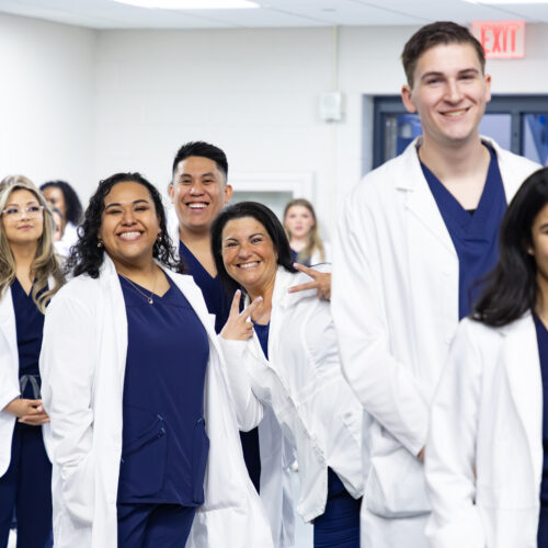 Group of Brookdale Community College nurses celebrating getting their pins.